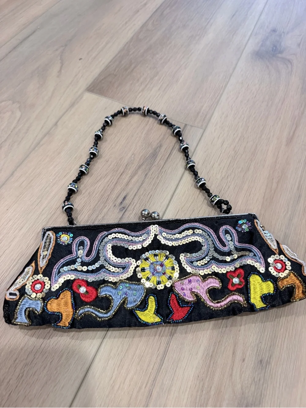 Vintage Chateau handbag features multicolor bead and sequin embroidery